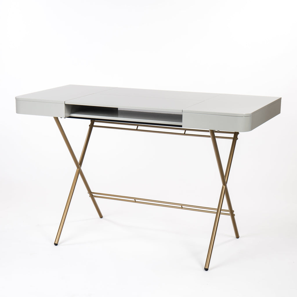 Bureau Cosimo laqué gris brillant, piètement doré, vue de trois quarts